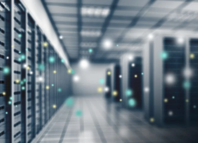 Data center server racks with glowing lights, illustrating secure, reliable data management and storage systems.