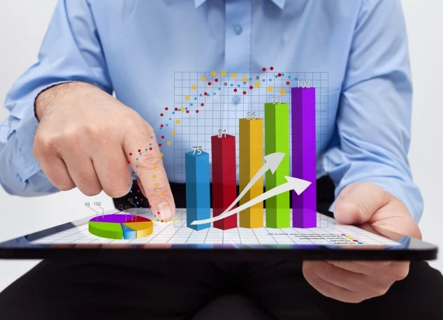 Data analytics: person using tablet with colorful bar chart, upward arrows, and a pie chart for insights.